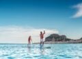 Guests enjoying a water activity off the coast