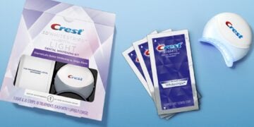 Crest whitening strip kit shown with its light