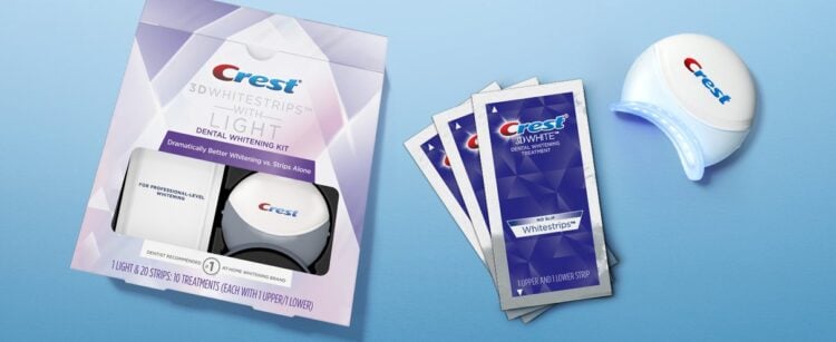 Crest whitening strip kit shown with its light