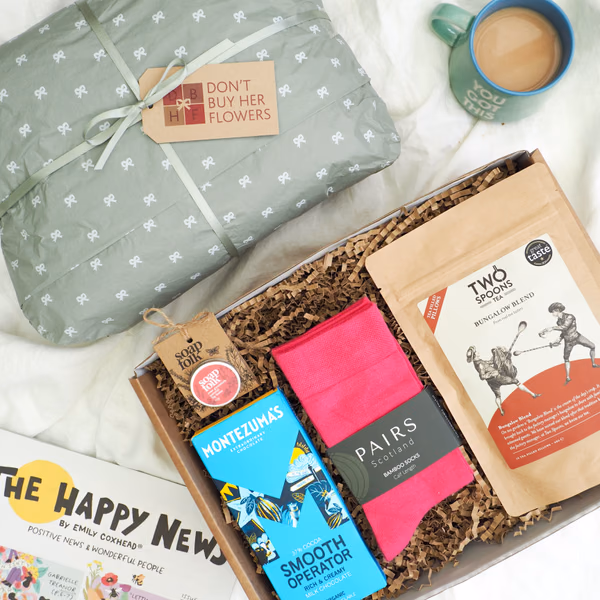 A birthday gift box arranged with treats