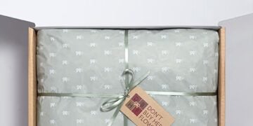 A wrapped gift box from Don't buy her flowers