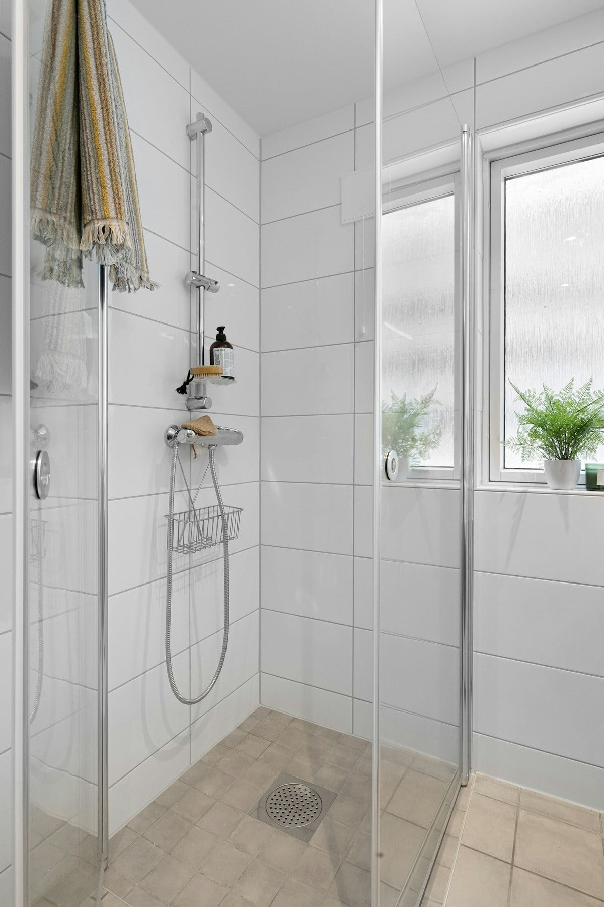 Minimal bathroom interior with storage and mirror