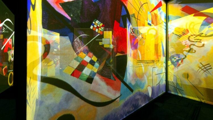 Visitors inside a colourful Frameless gallery installation