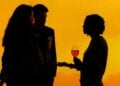 Visitors chatting over drinks in the Frameless gallery during an after-hours session