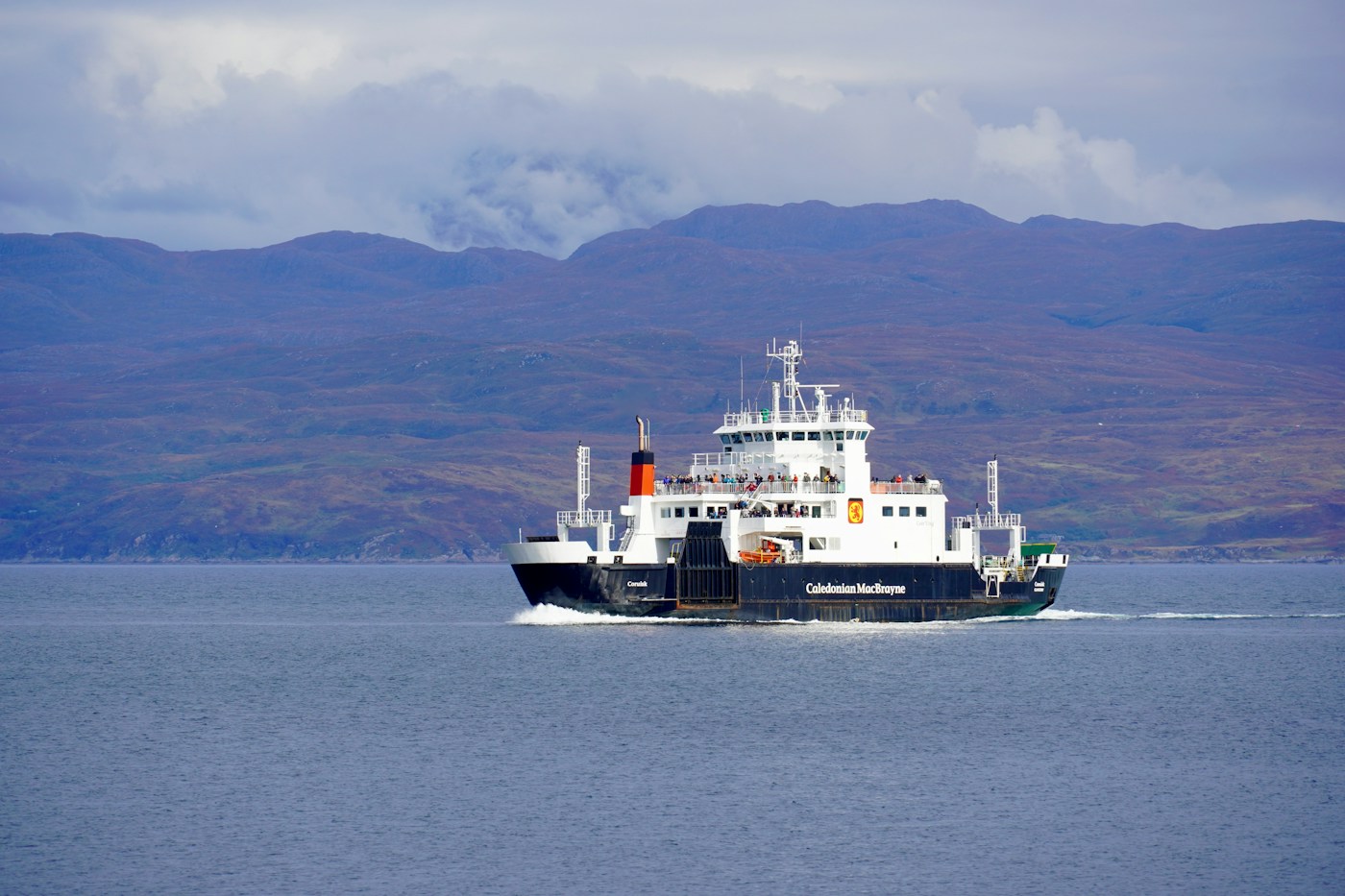 Passenger ferry crossing a broad stretch of water