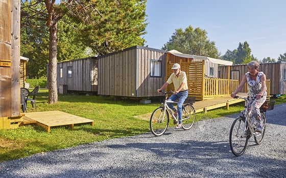 Two guests cycling at Riva Bella