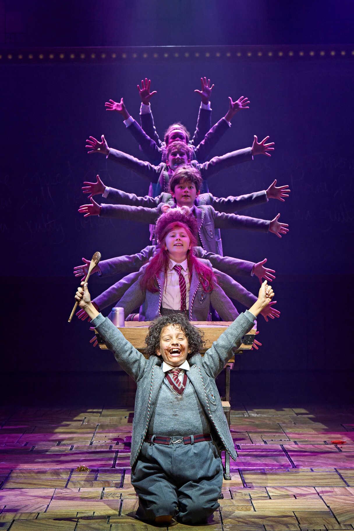 Ensemble performing together in Matilda