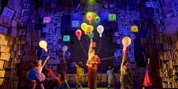 Young performers appear together in a scene from Matilda The Musical