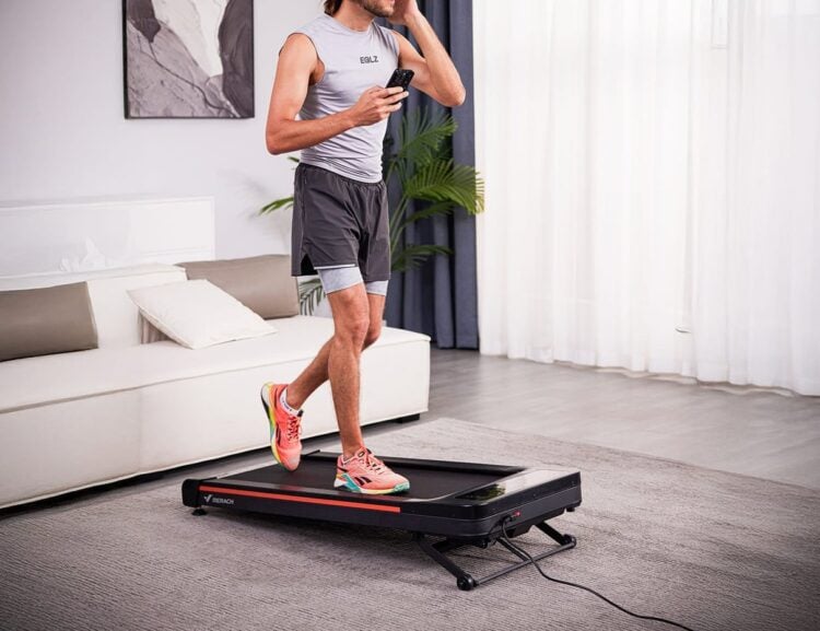 Merach walking pad shown in a home setting