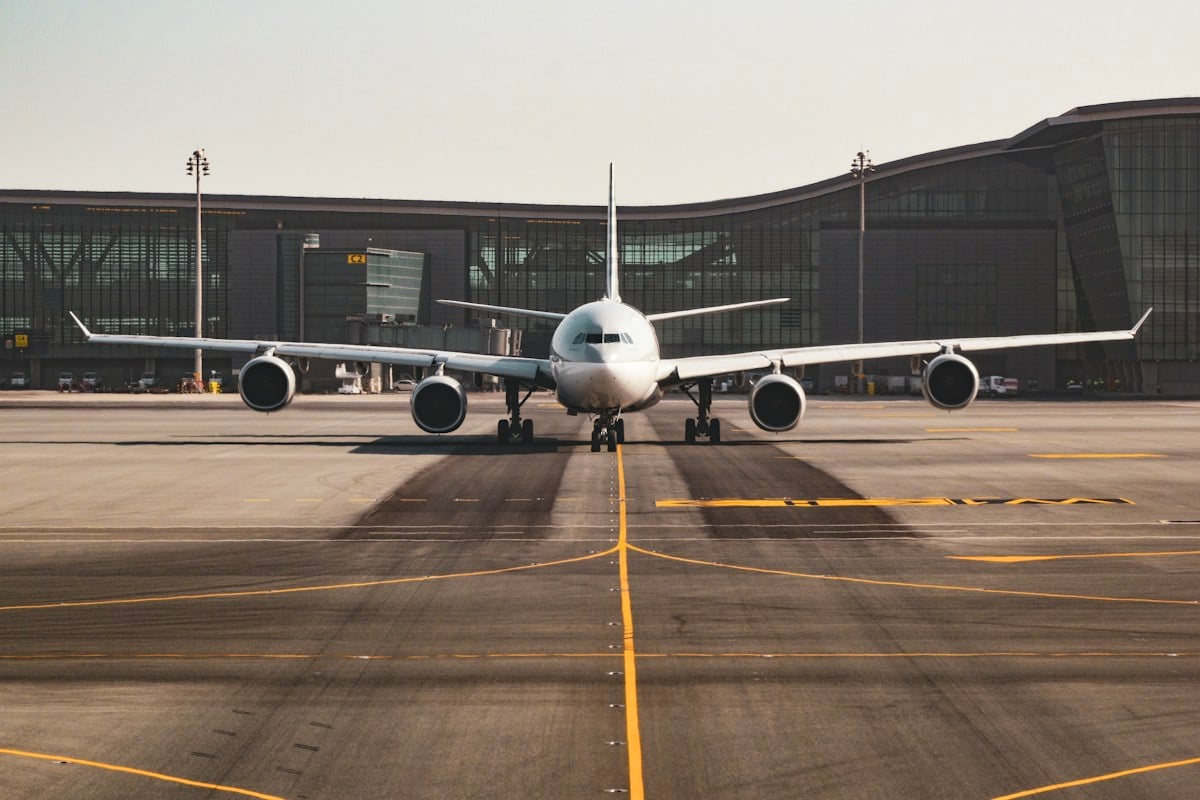 Airplane taxiing at an airport terminal