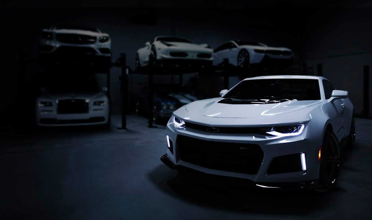 White sports car in a garage