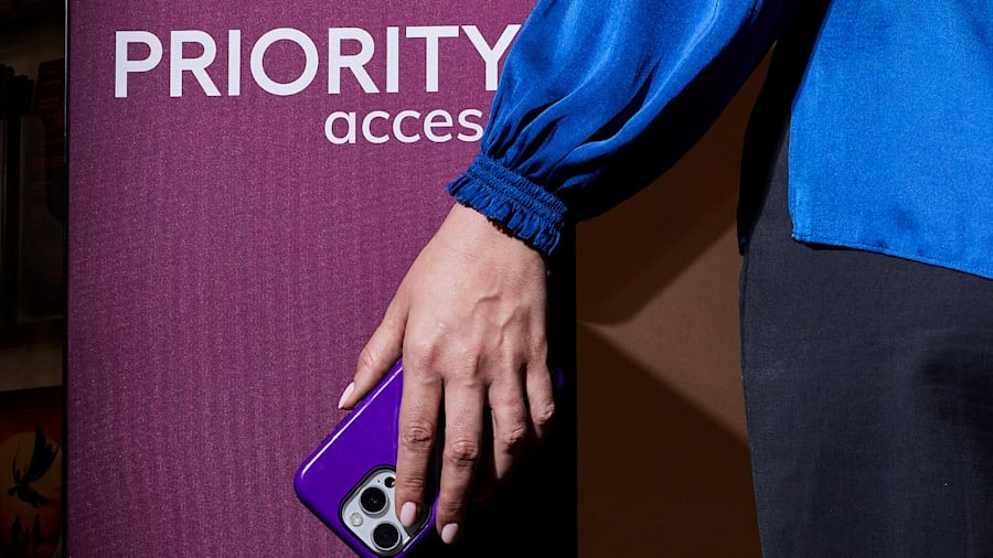 Priority access sign beside a theatre visitor