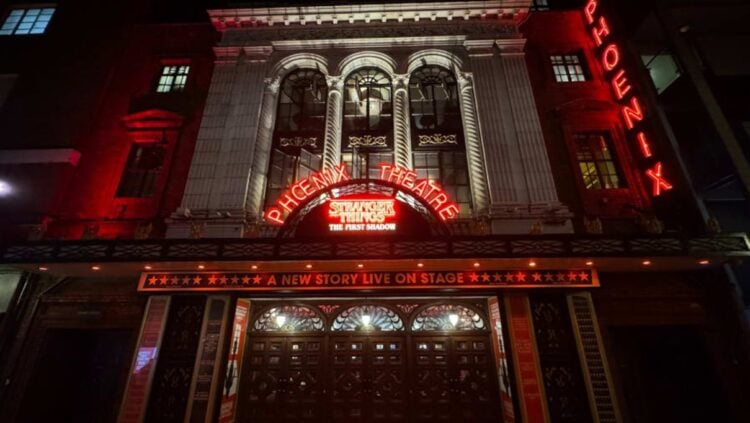 The Phoenix Theatre exterior illuminated at night for Stranger Things: The First Shadow
