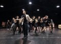 Cast rehearsing a dance number for Sinatra the Musical
