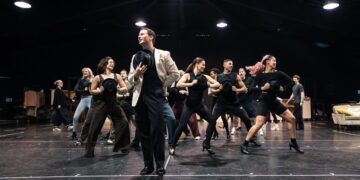 Cast rehearsing a dance number for Sinatra the Musical