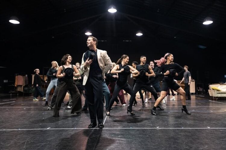 Cast rehearsing a dance number for Sinatra the Musical