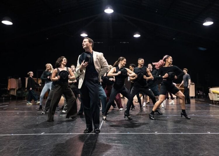 Cast rehearsing a dance number for Sinatra the Musical